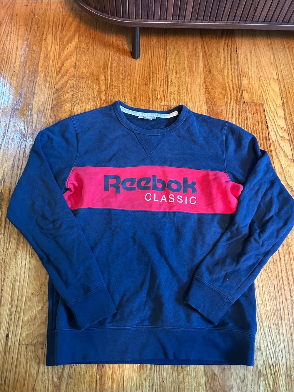 Reebok Men’s Navy Crewneck Sweatshirt with Red Chest Panel